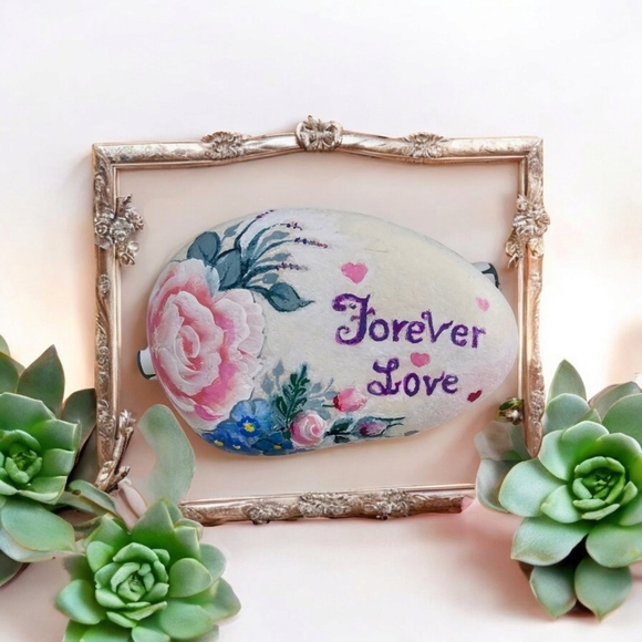 Painted LOVE river rock with rosy- peach roses, blue accent flowers, and hearts - Picture 10 of 17